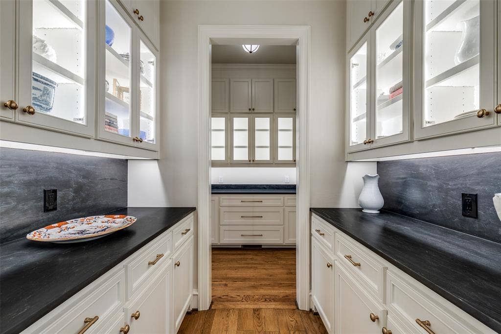 17316 Club Hill Lane, Dallas, TX 75248 Butlers pantry off the dining & kitchen with velvet granite countertops and enviable storage space.