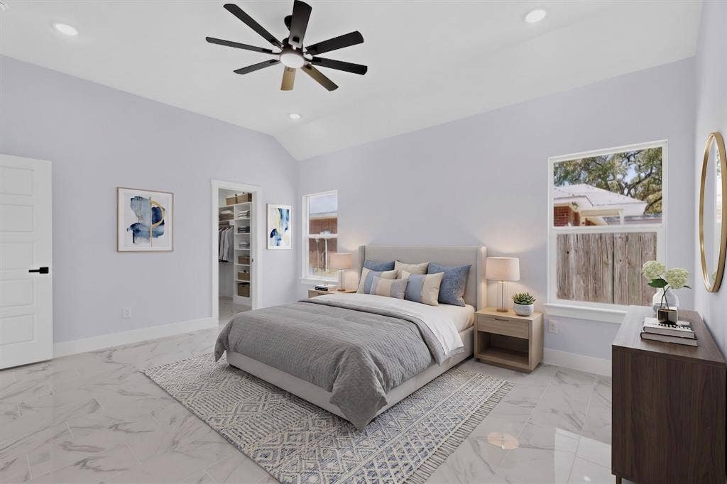102 Redondo Drive, Gun Barrel City, TX 75156 Vaulted ceiling with an installed ceiling fan, recessed lighting, expansive windows, and durable tile flooring