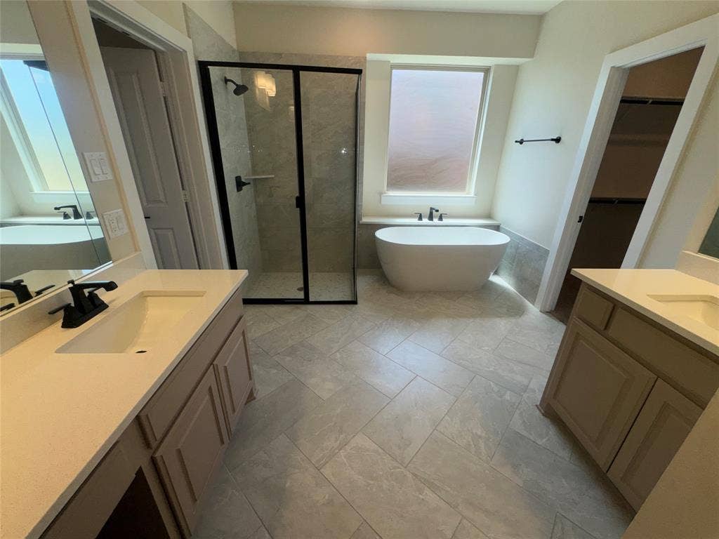 1701 Shamrock Green, Mesquite, TX 75181 Dual vanities with integrated sinks and matte black fixtures