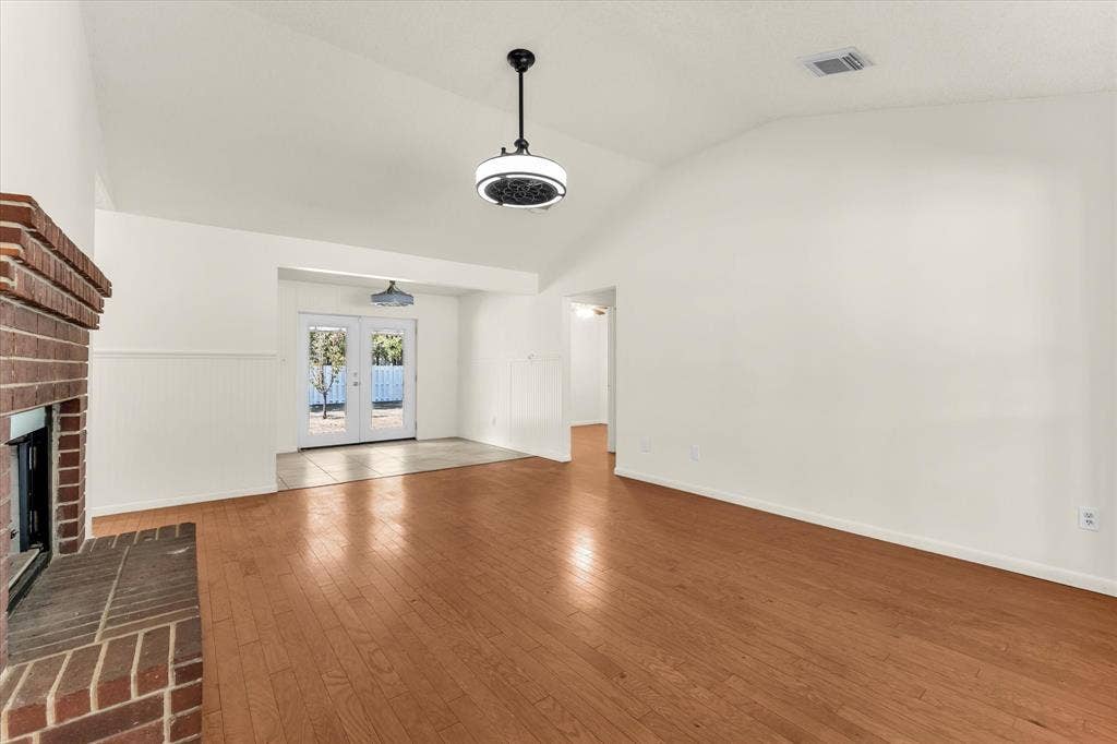 4626 Lexington Street, Bellmead, TX 76705 Vaulted ceilings complemented by a ceiling fan with integrated lighting
