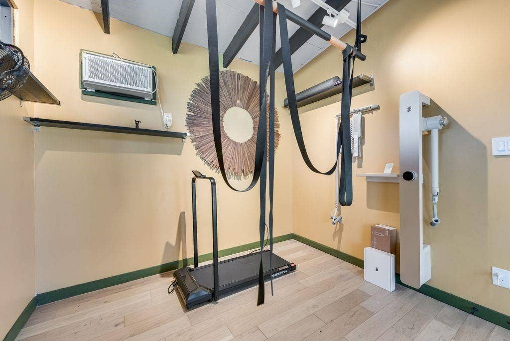 529 Carol Court, Richardson, TX 75081 Inside the backyard studio which is currently used as an exercise space.