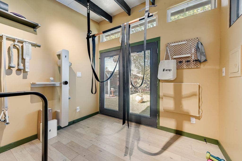 529 Carol Court, Richardson, TX 75081 Inside the backyard studio which is currently used as an exercise space.
