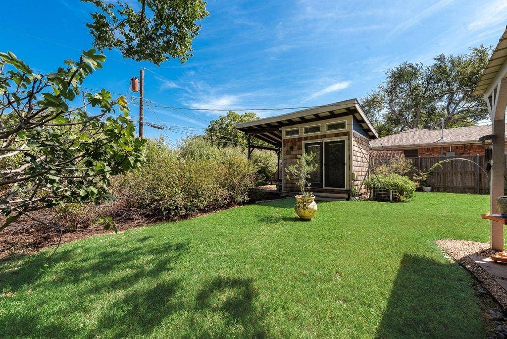 529 Carol Court, Richardson, TX 75081 Backyard features a 10x10 stand-alone, termperature controlled studio equipped with electricty. Currently used as an exercise space, it could be great home office, work shop or craft room.