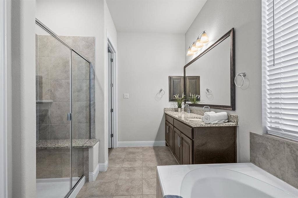 Huge shower and stand alone tub