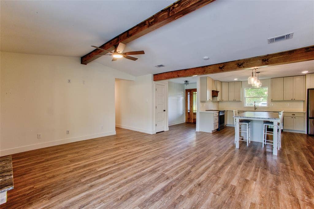 Great Sight-lines Across the Family Gathering Space wExposed Stained Beams
