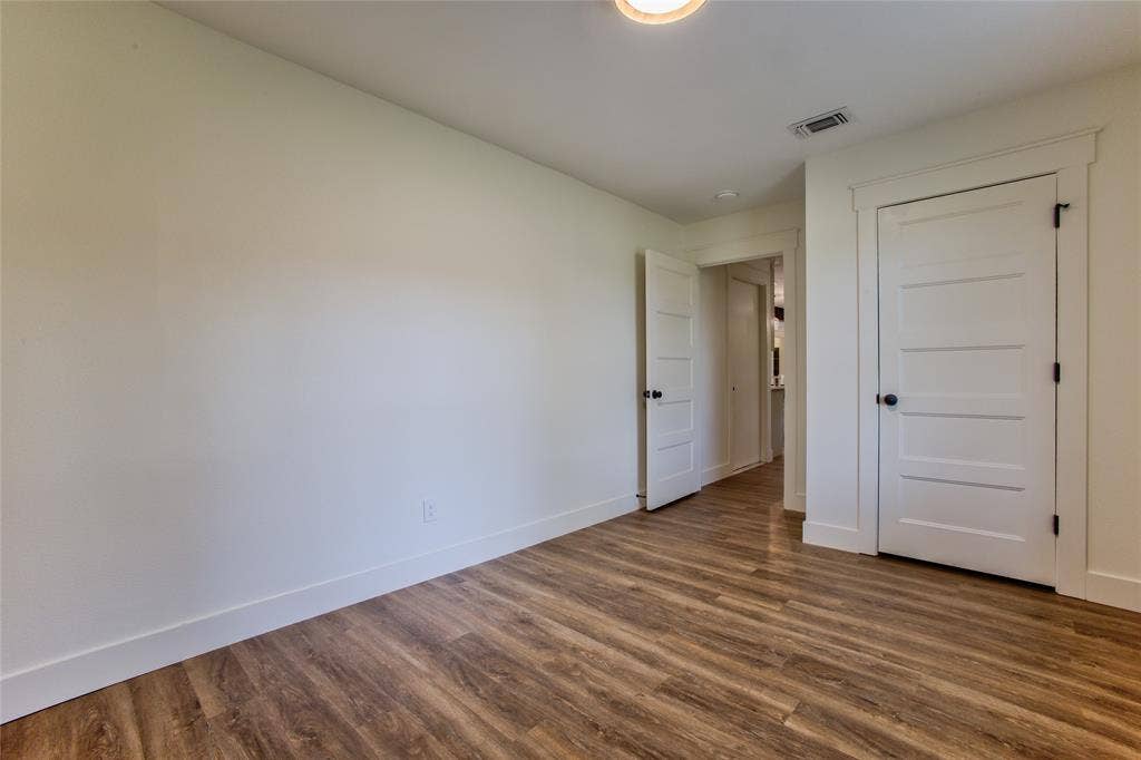 View #2 Into #1 Bedroom Or Home Office wNew Recessed  Light, LVP Flooring Thoughout.