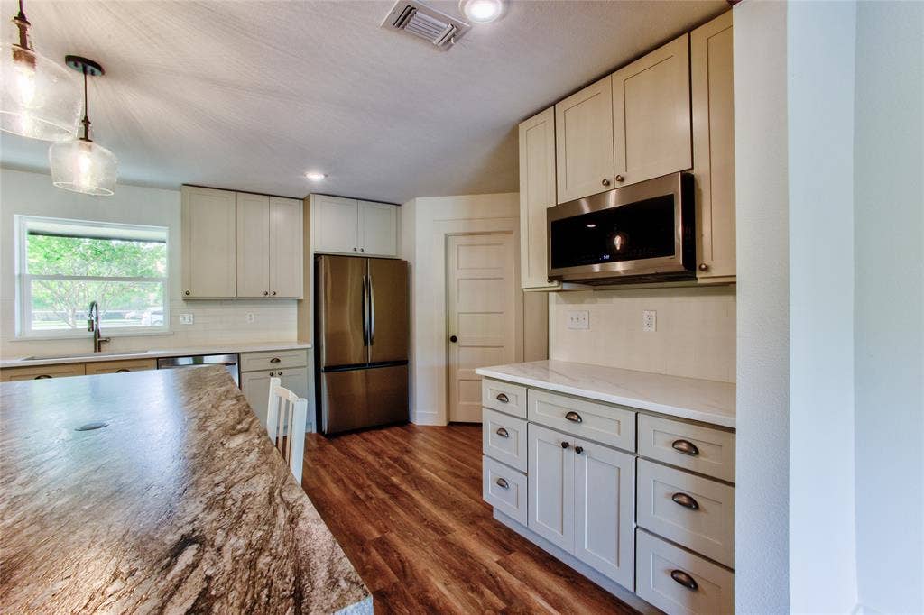 Accommodating Coffee Bar Spot under the Built-in Microwave
