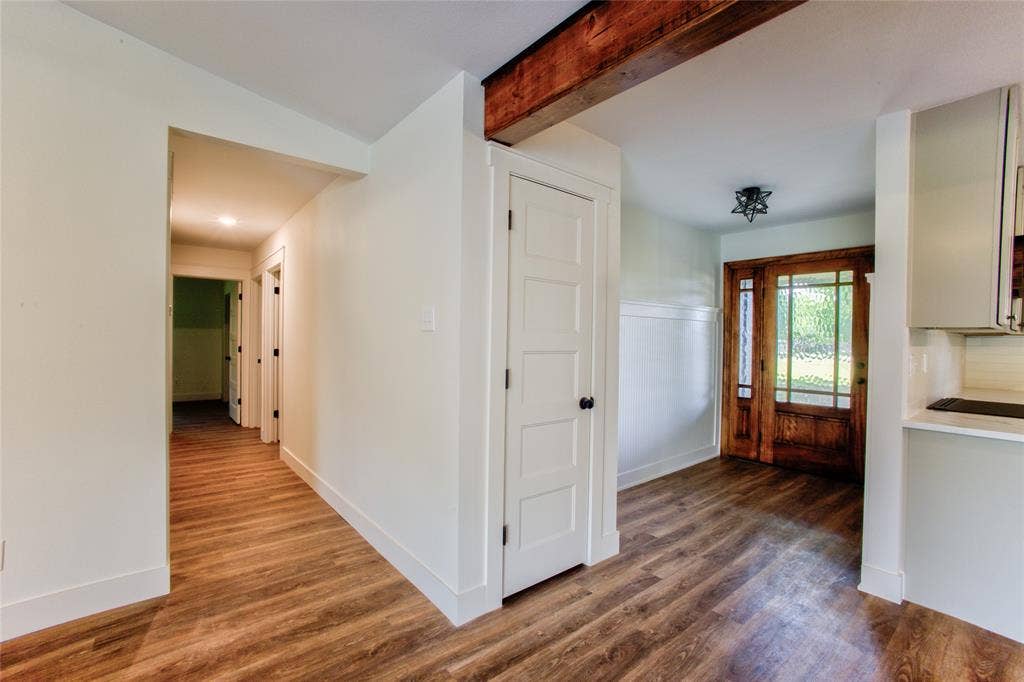 View into the Bedroom Hall & Back at the Front Entry Door