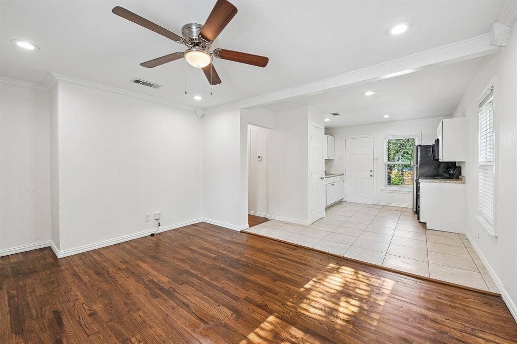 5012 Pamela Drive, Fort Worth, TX 76116 Wood-finish flooring, recessed lighting, ceiling fan, white cabinetry, and tile flooring