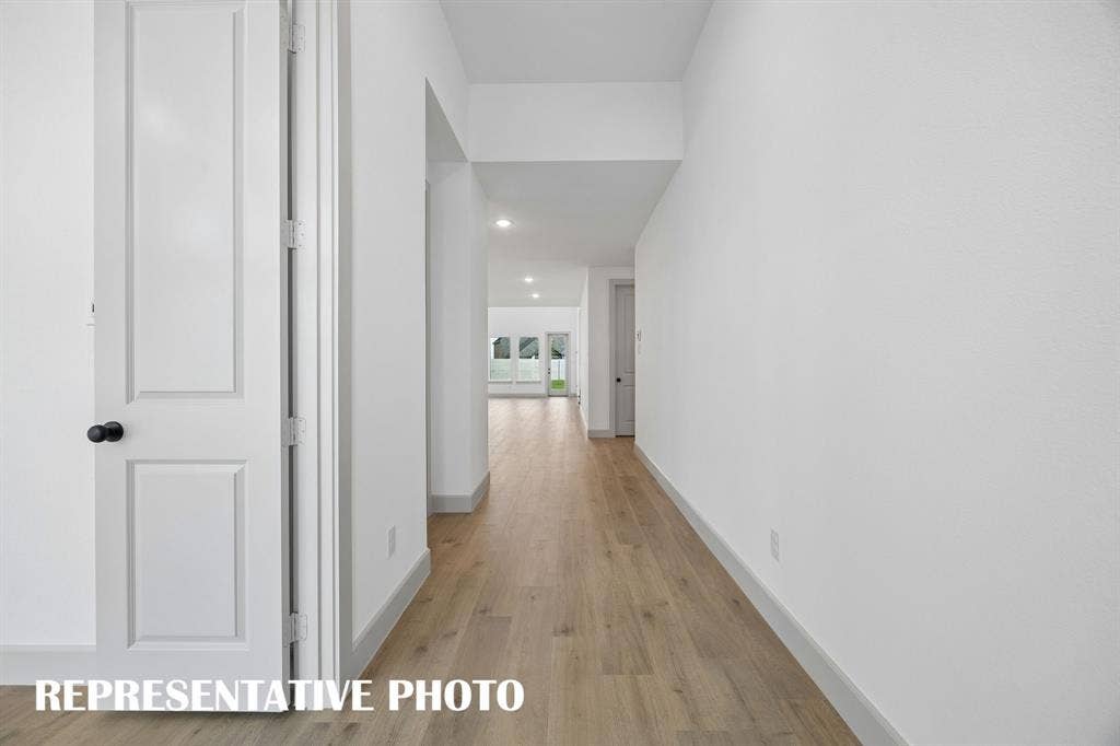 2629 Radiant Way, Celina, TX 75009 Open the door and enjoy site lines from the front through to the rear of this dream home including ample wall space to showcase artwork and family memories! REPRESENTATIVE PHOTO