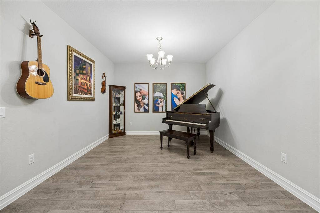 2335 Whitney Lane, Wylie, TX 75098 Spacious Formal Dining is a flexible space for grand pianos!