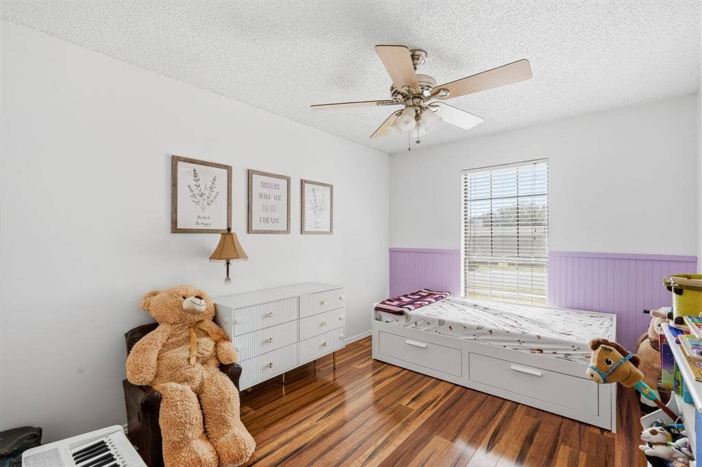 8204 Lara Lane, Watauga, TX 76148 Bedroom 3 also has a large closet and lots of natural light.