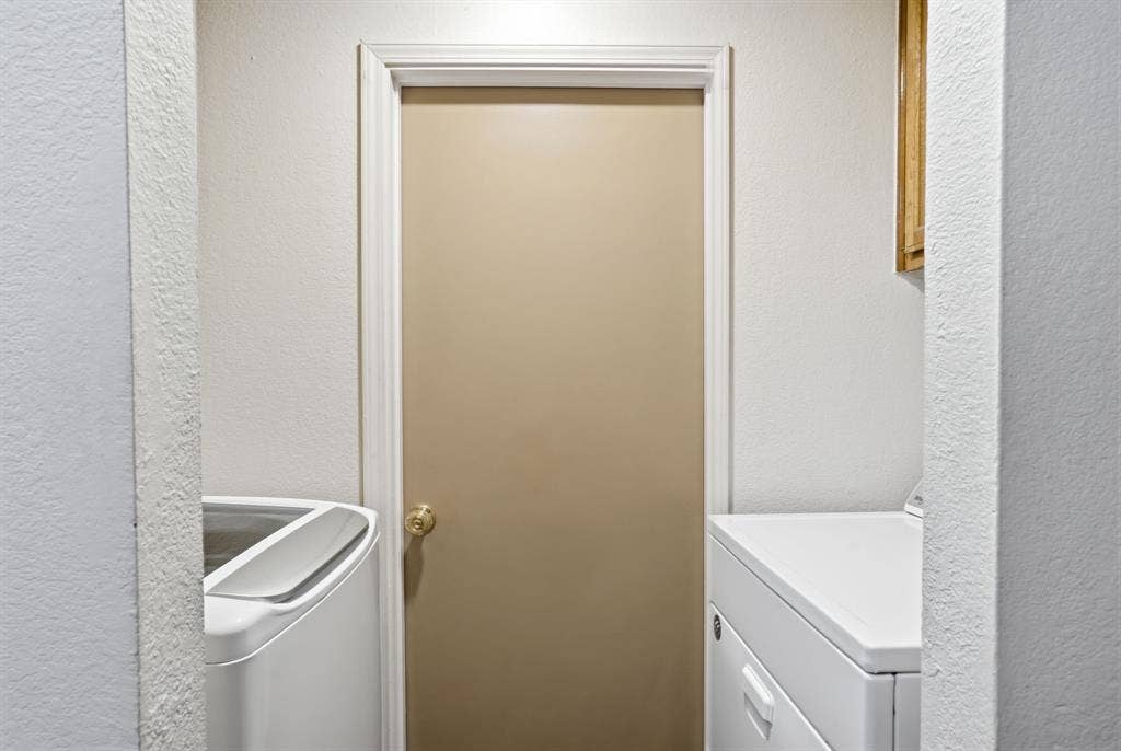 8204 Lara Lane, Watauga, TX 76148 Laundry area is INSIDE the house.