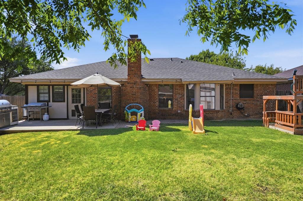 8204 Lara Lane, Watauga, TX 76148 Enjoy the outdoors under the shade of this mature tree, large patio for BBQs