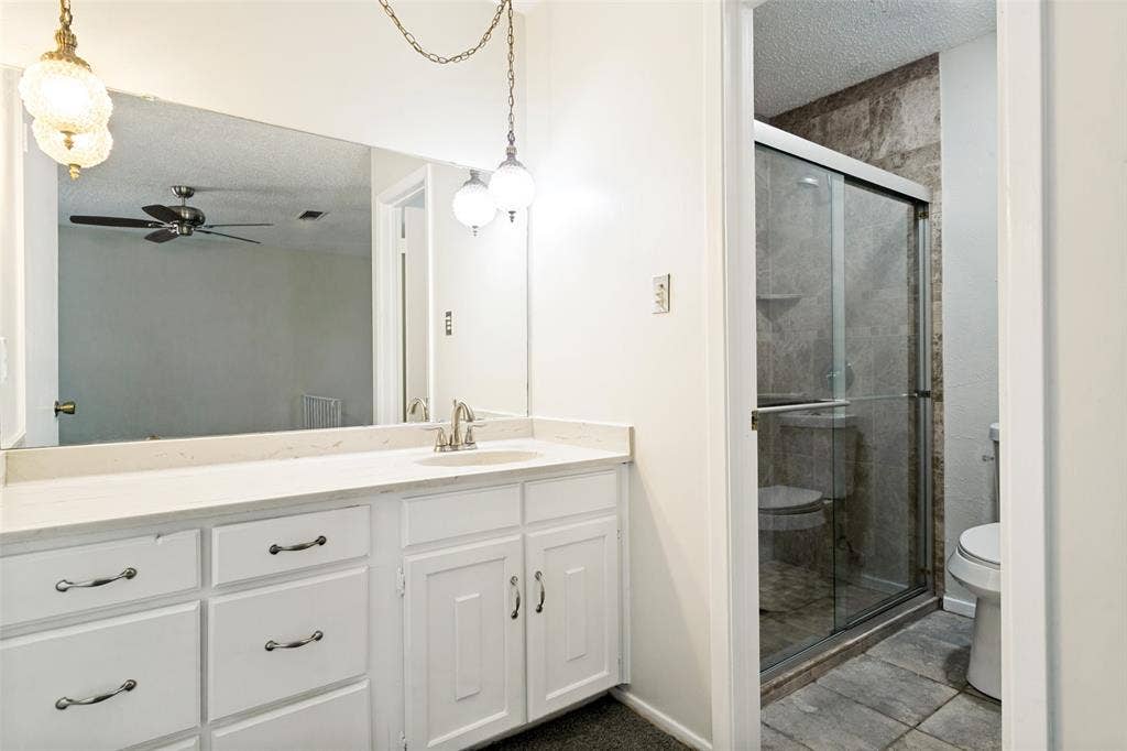 The primary bathroom offers good space to start and end your day comfortably. A convenient private bath adds to the appeal of the primary suite.