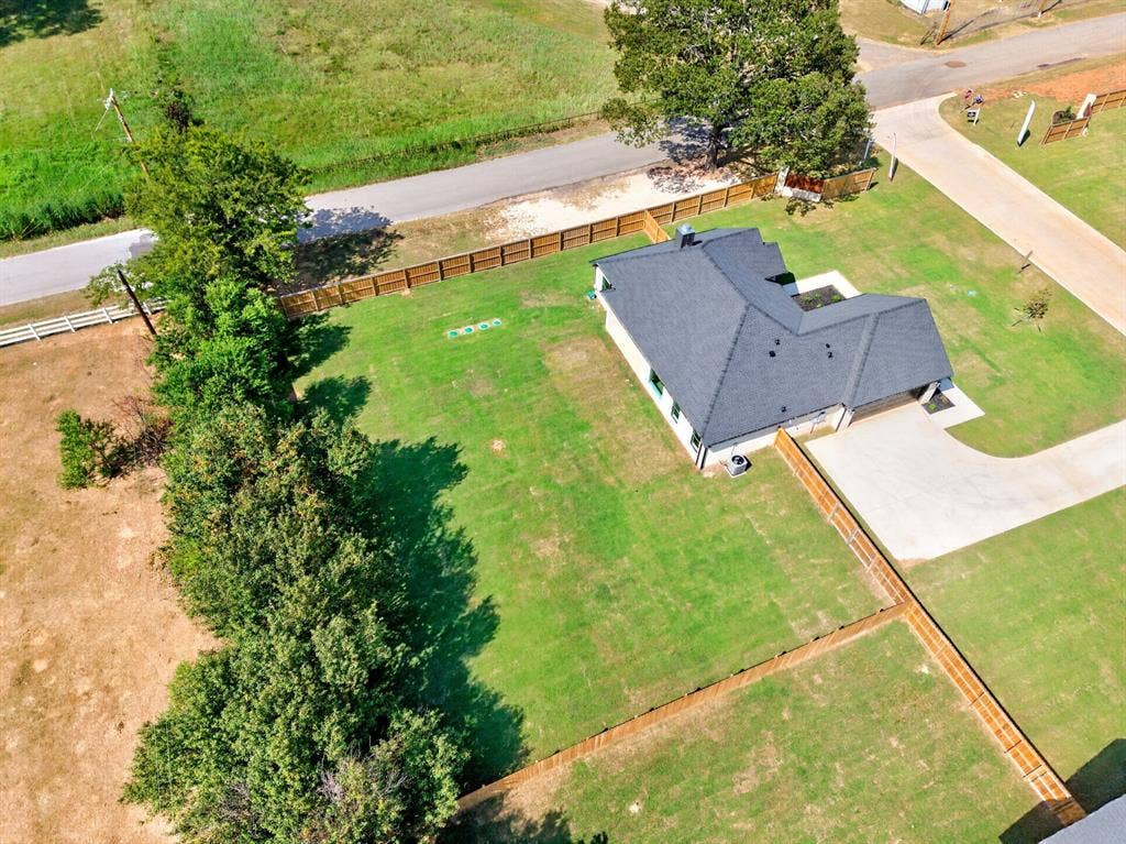 302 Grace Lane, Athens, TX 75751 Aerial view of 302 Grace lane, a high end, transitional style, new construction home on half acre lot (.50) intentionally designed to add a site built shop or pool.