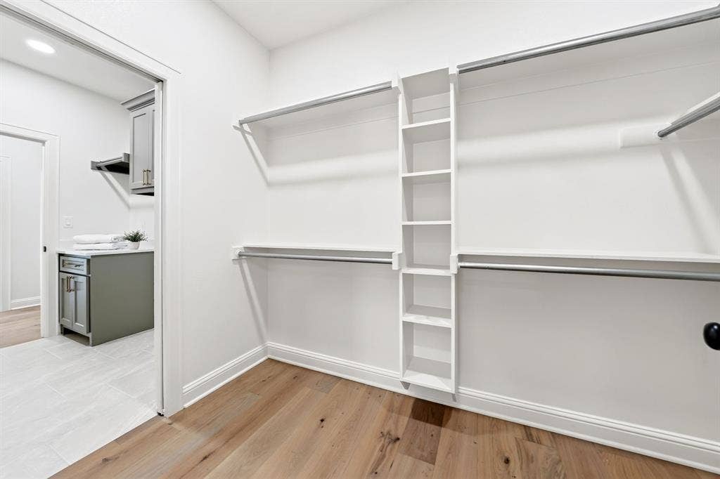 302 Grace Lane, Athens, TX 75751 Primary closet connects to the primary bathroom & laundry room.