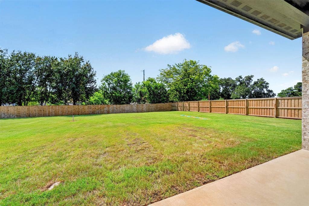 302 Grace Lane, Athens, TX 75751 View of backyard featuring irrigation installed for easy maintence.
