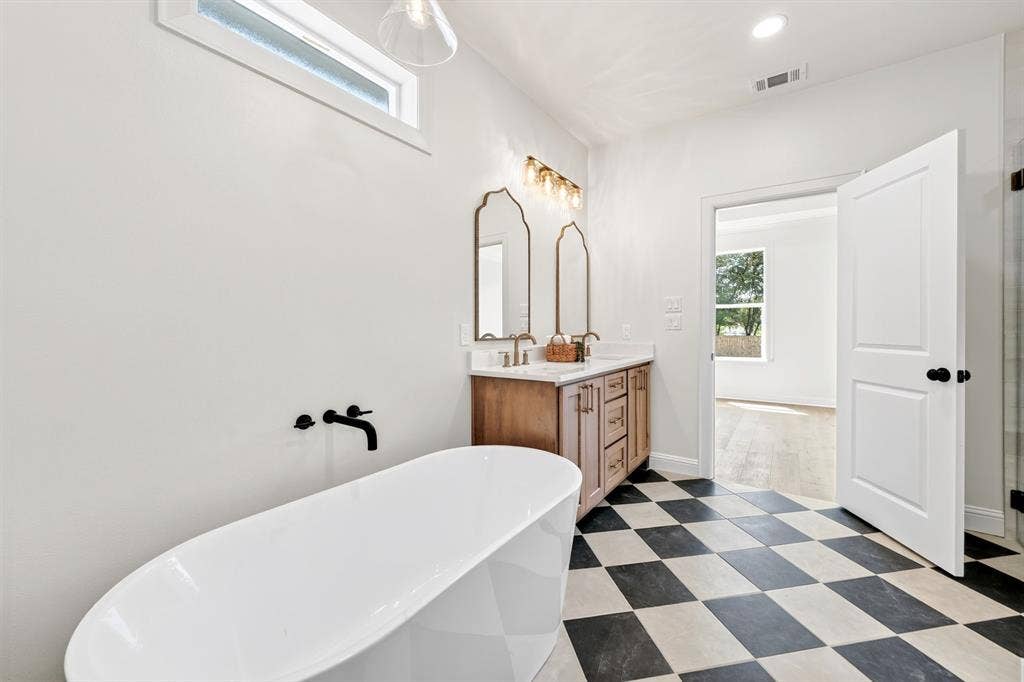 302 Grace Lane, Athens, TX 75751 Primary bathroom with views of the primary suite.