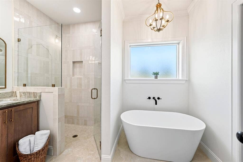 305 Grace Lane, Athens, TX 75751 Freestanding soaking tub with a wall-mounted matte black faucet