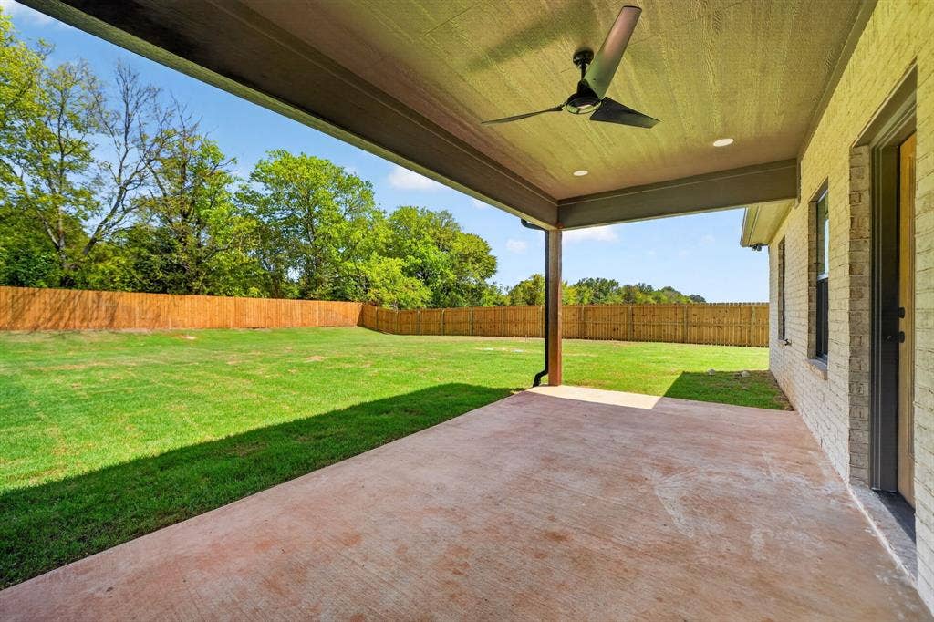 305 Grace Lane, Athens, TX 75751 Expansive covered patio with concrete flooring, recessed lighting, and a ceiling fan