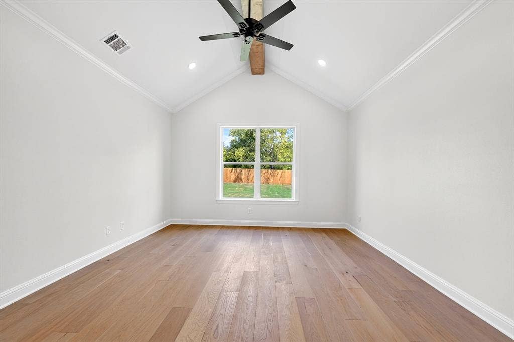 305 Grace Lane, Athens, TX 75751 Vaulted ceiling, wood-finish flooring, recessed lighting, ceiling fan, and a window with exterior views