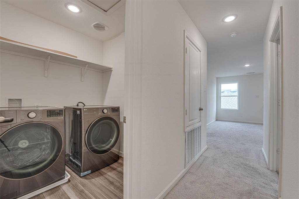 767 Camden Drive, Lavon, TX 75166 Dedicated laundry area with wood-finish flooring and built-in shelving