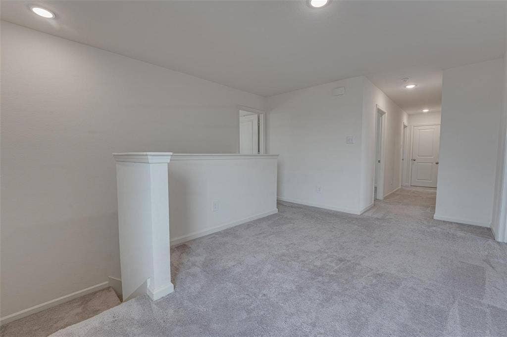 767 Camden Drive, Lavon, TX 75166 Carpeted landing with recessed lighting and painted walls
