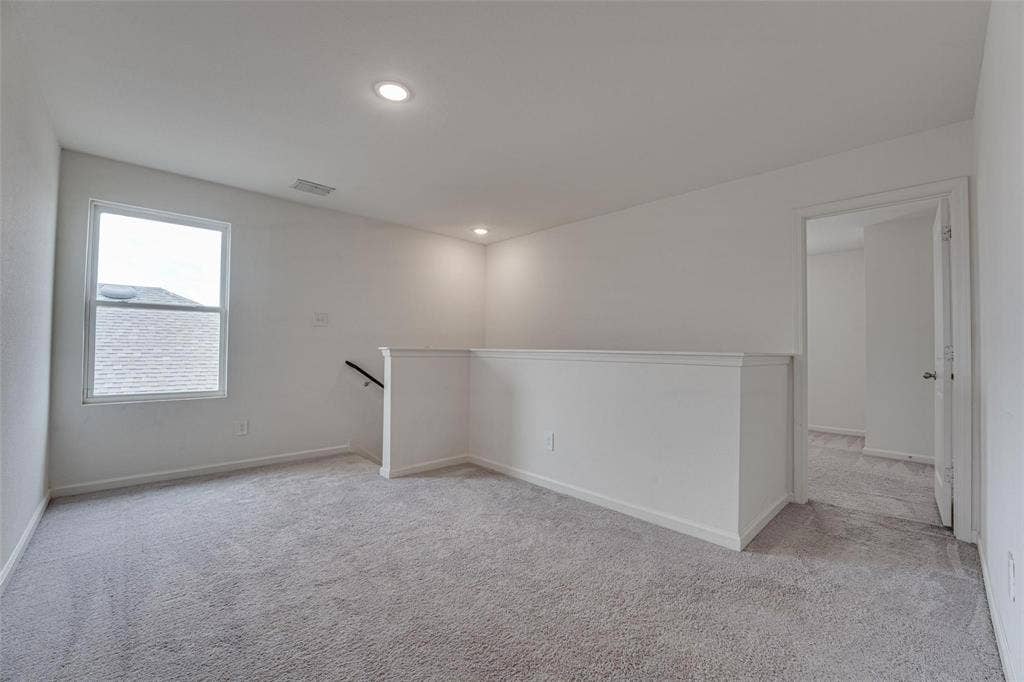 767 Camden Drive, Lavon, TX 75166 Light gray carpeting, white painted walls, recessed lighting, and a white interior door