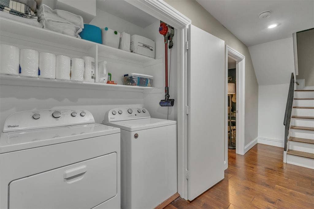 4242 Travis Street, #102, Dallas, TX 75205 Laundry area with a full-size washer and dryer, built-in shelving.