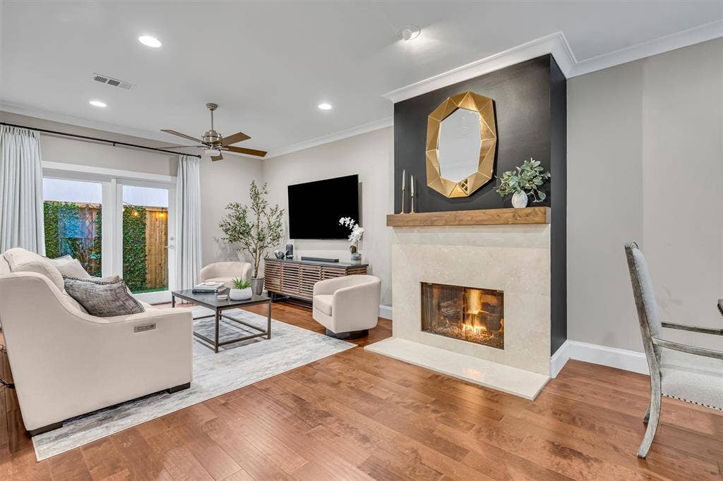 4242 Travis Street, #102, Dallas, TX 75205 Wood-finish flooring throughout, recessed lighting, and a ceiling fan