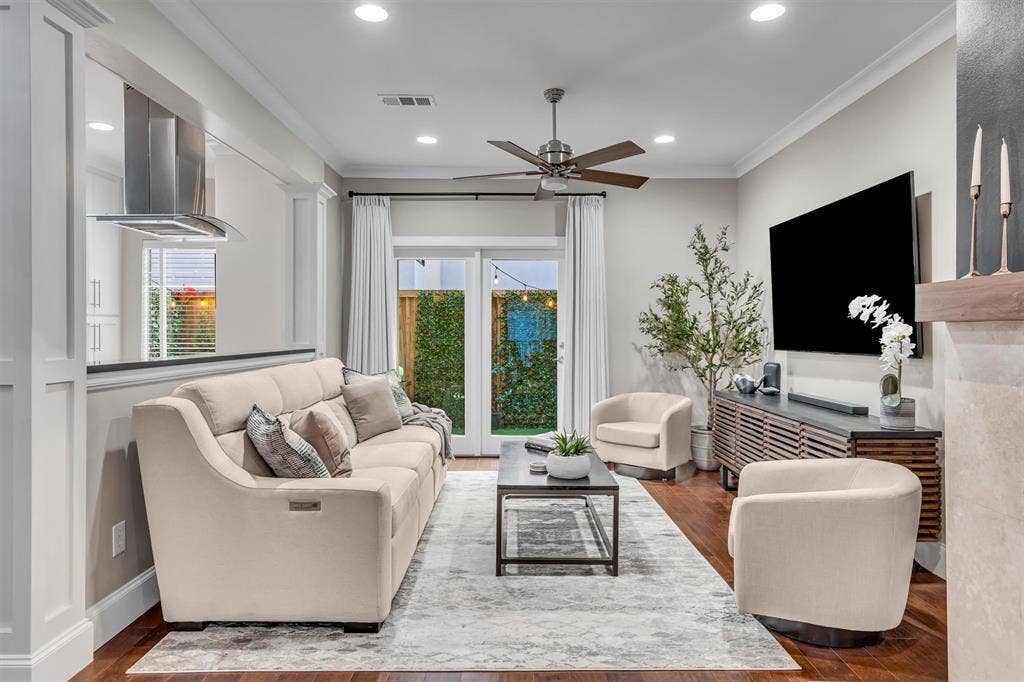 4242 Travis Street, #102, Dallas, TX 75205 Recessed lighting illuminates wood-finish flooring, a ceiling fan, and crown molding