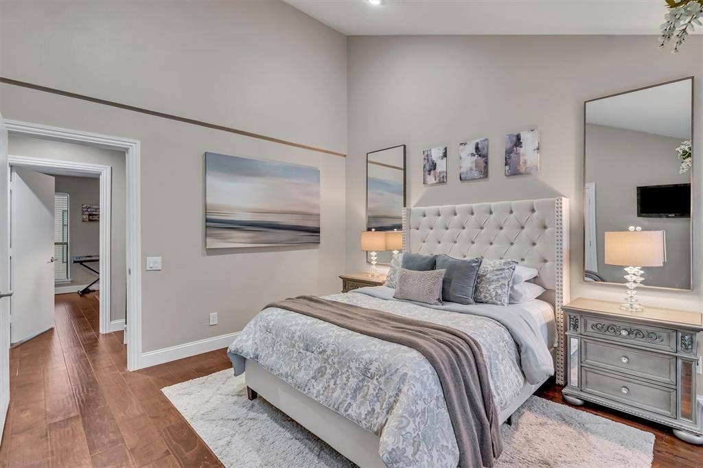 4242 Travis Street, #102, Dallas, TX 75205 Primary bedroom. Hardwood-style flooring throughout