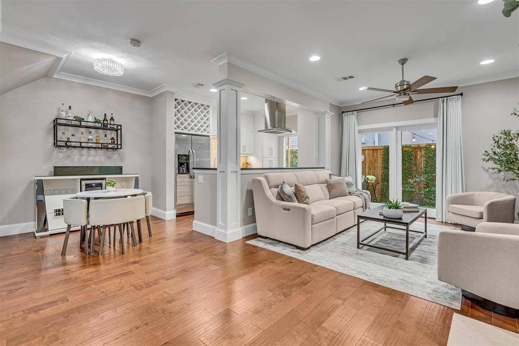 4242 Travis Street, #102, Dallas, TX 75205 Wood-finish flooring throughout, recessed lighting, and a ceiling fan