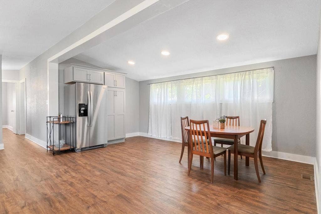 230 Shady Shores Drive, Mabank, TX 75156 Recessed ceiling lighting, wood-finish flooring, white trim, and a wide window opening