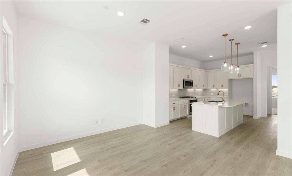 1000 Comfort Drive, Plano, TX 75075 Open Kitchen-Living Room