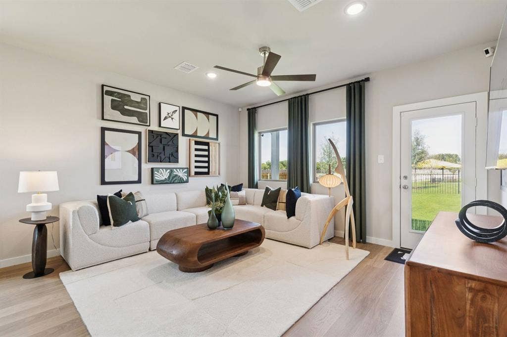 2713 Delevan Drive, Princeton, TX 75407 Living Room in the Magnolia home plan by Trophy Signature Homes – REPRESENTATIVE PHOTO