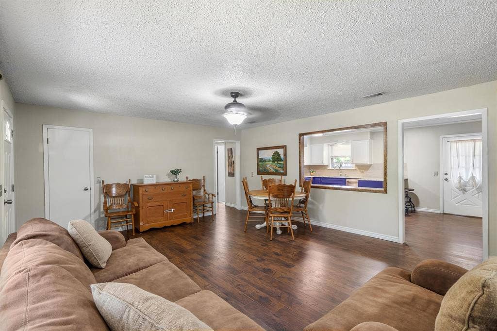 2941 Trey Circle, Athens, TX 75752 Kitchen dining and living room intertwine for an open concept with MCM charm