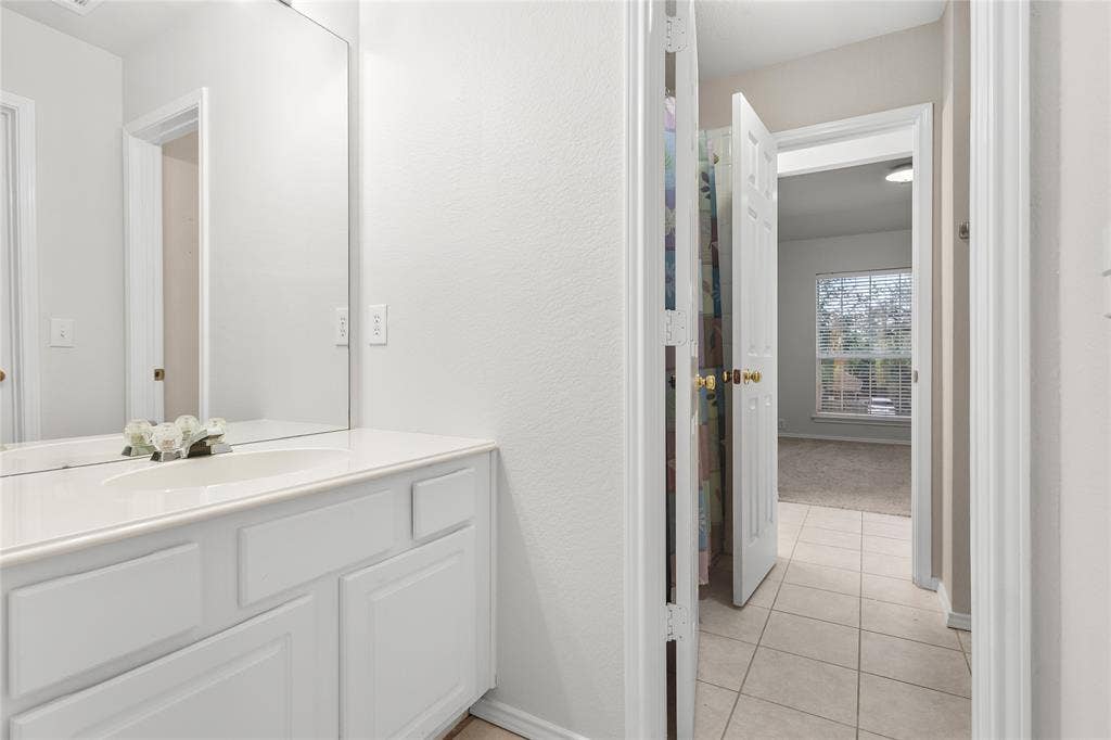 3328 Timber Brook Drive, Plano, TX 75074 Jack & Jill bathroom between bedrooms #2 & #3