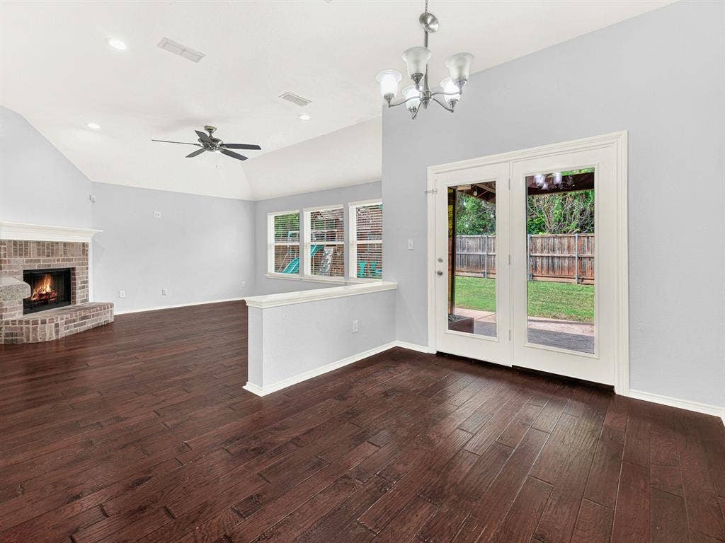 7409 High Point Drive, Sachse, TX 75048 Second dining area and living room with views of the backyard