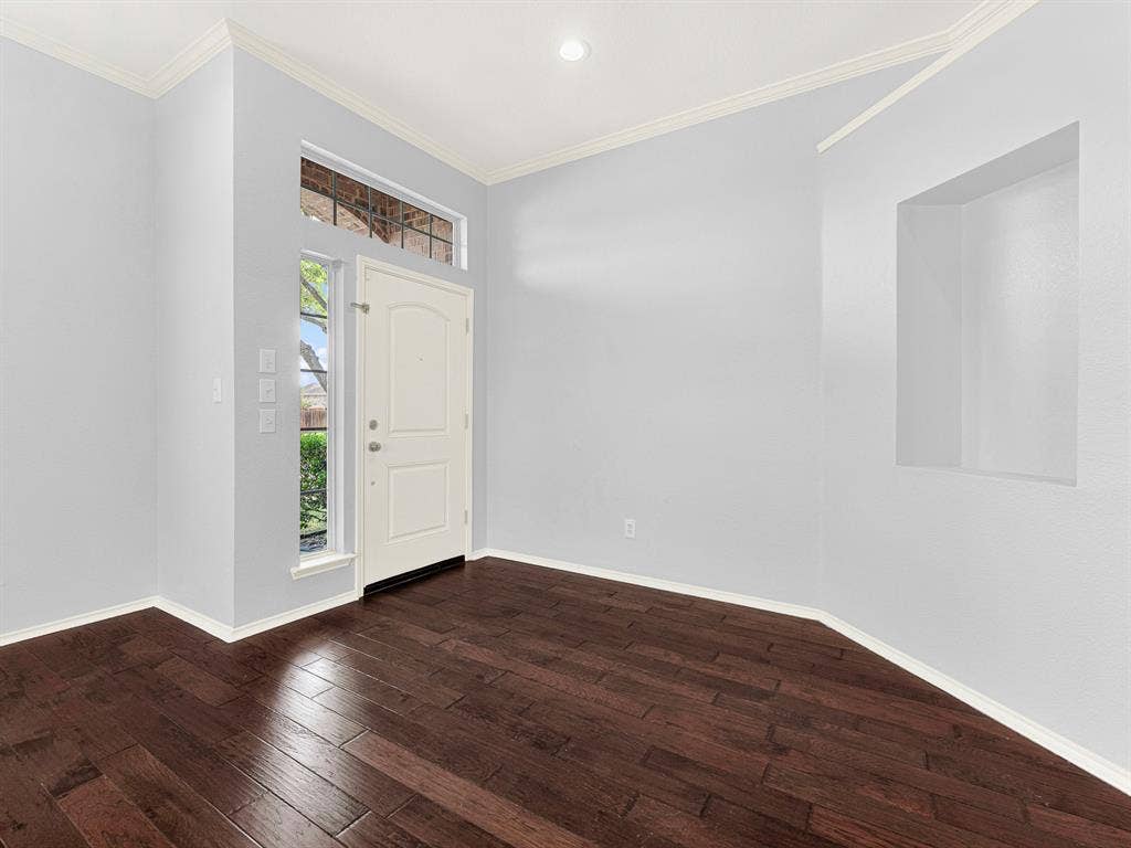 7409 High Point Drive, Sachse, TX 75048 Warm hardwood floors and recessed lighting