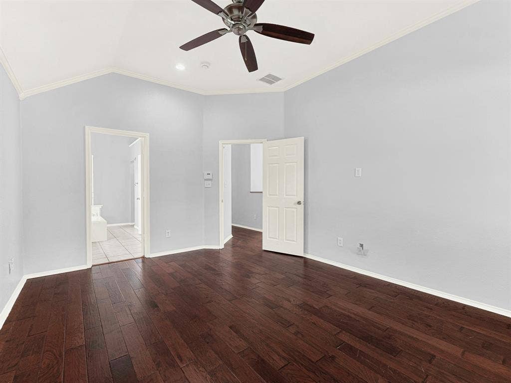 7409 High Point Drive, Sachse, TX 75048 Primary bedroom and ensuite bathroom