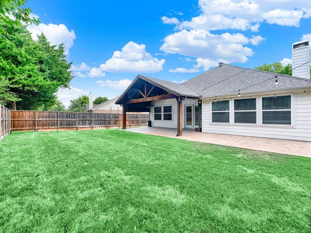 7409 High Point Drive, Sachse, TX 75048 Extended patio for grilling and entertaining in a large, private backyard