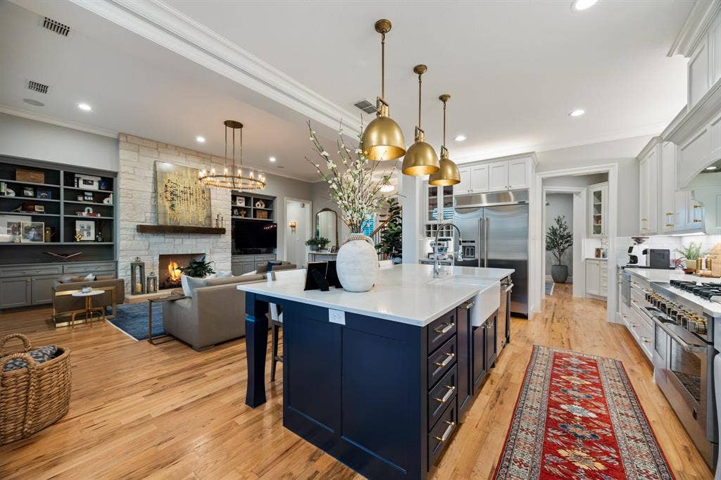 2201 Hanna Court, Midlothian, TX 76065 Kitchen opens seamlessly to the living and dining spaces, ideal for entertaining.