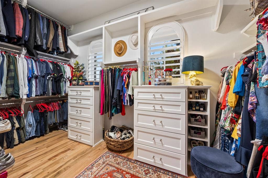 2201 Hanna Court, Midlothian, TX 76065 Primary closet built out with custom shelving, ready to organize a full wardrobe.
