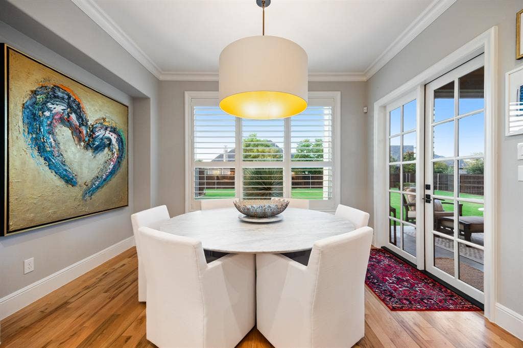 2201 Hanna Court, Midlothian, TX 76065 Breakfast nook bathed in morning light, with french doors leading straight out to the patio.