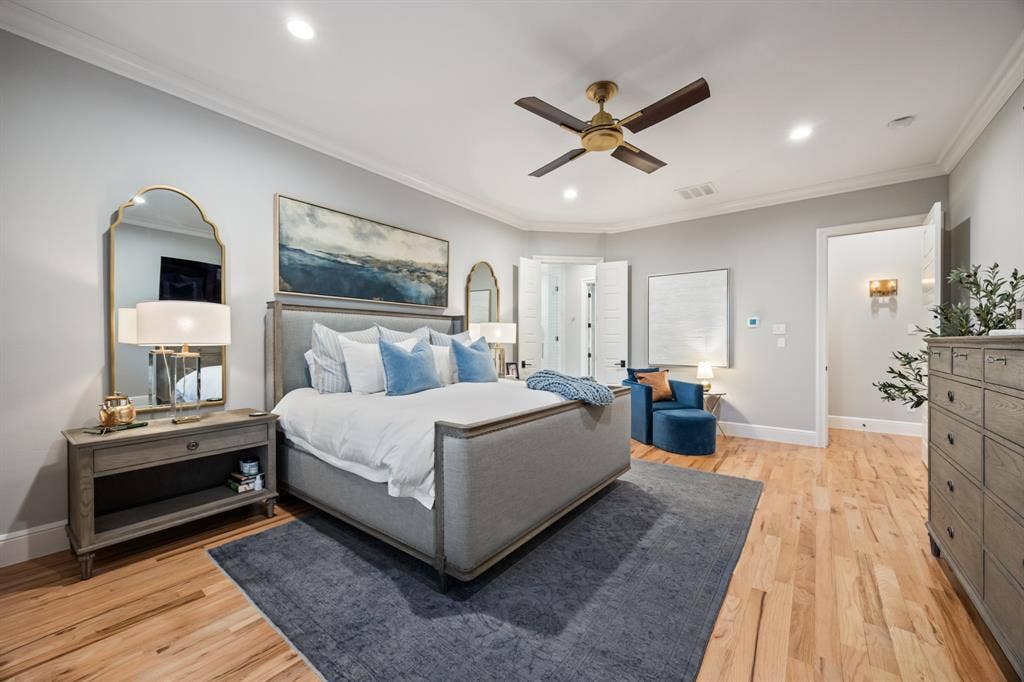 2201 Hanna Court, Midlothian, TX 76065 Primary bedroom offers a private retreat with a ceiling fan and backyard views.
