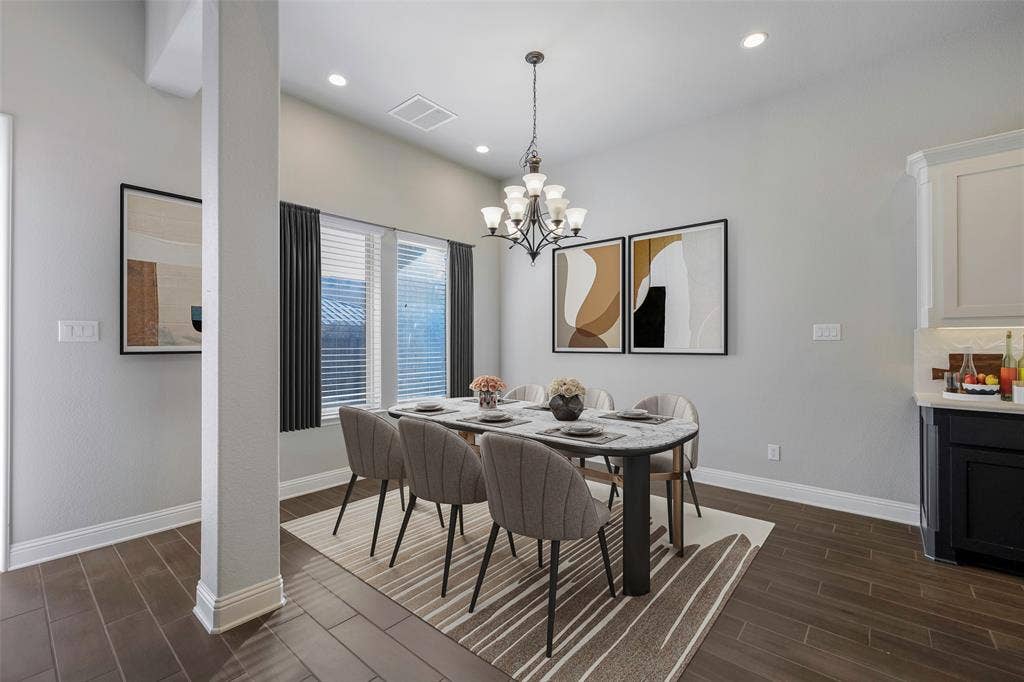 941 Leola Lane, Allen, TX 75013 Dining area featuring wood-finish flooring, recessed lighting, and a chandelier