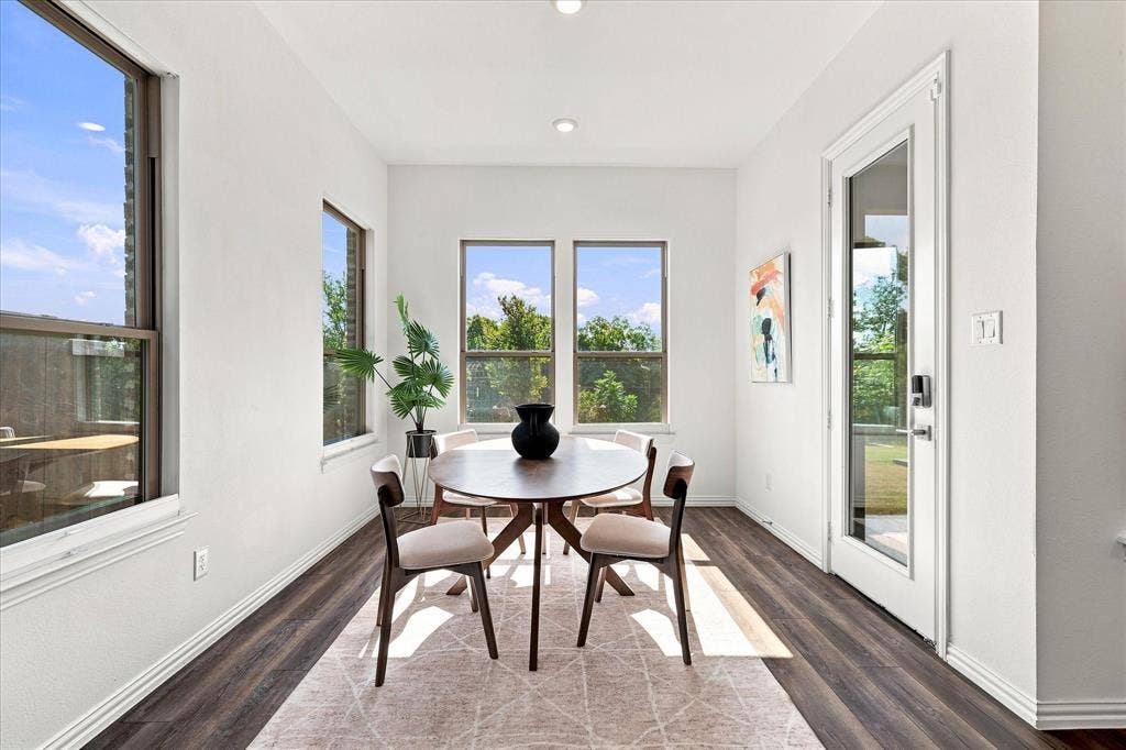 3109 Taunton Way, McKinney, TX 75069 Recessed lighting, wood-finish flooring, multiple windows, and a glass-paneled door