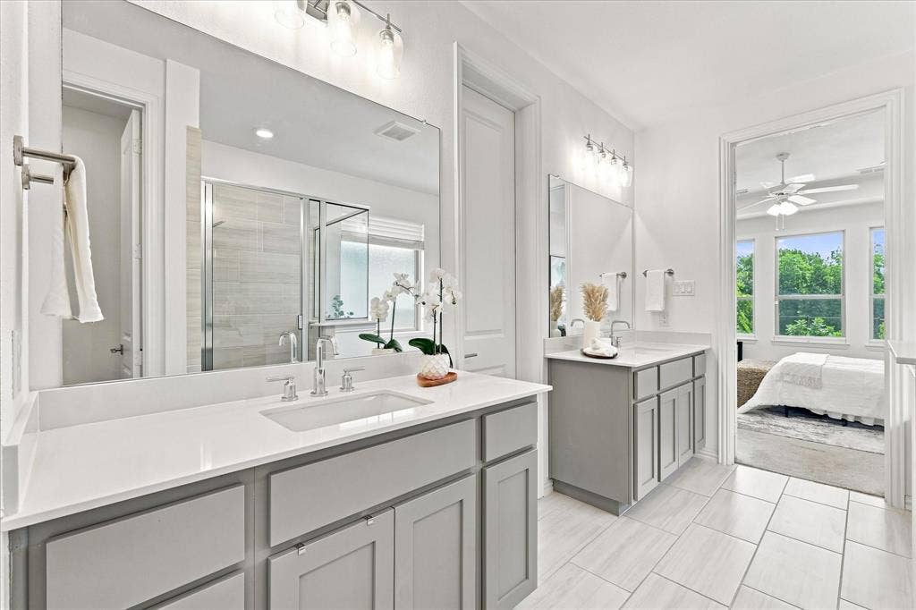 3109 Taunton Way, McKinney, TX 75069 Dual vanity with light gray cabinetry and white countertops